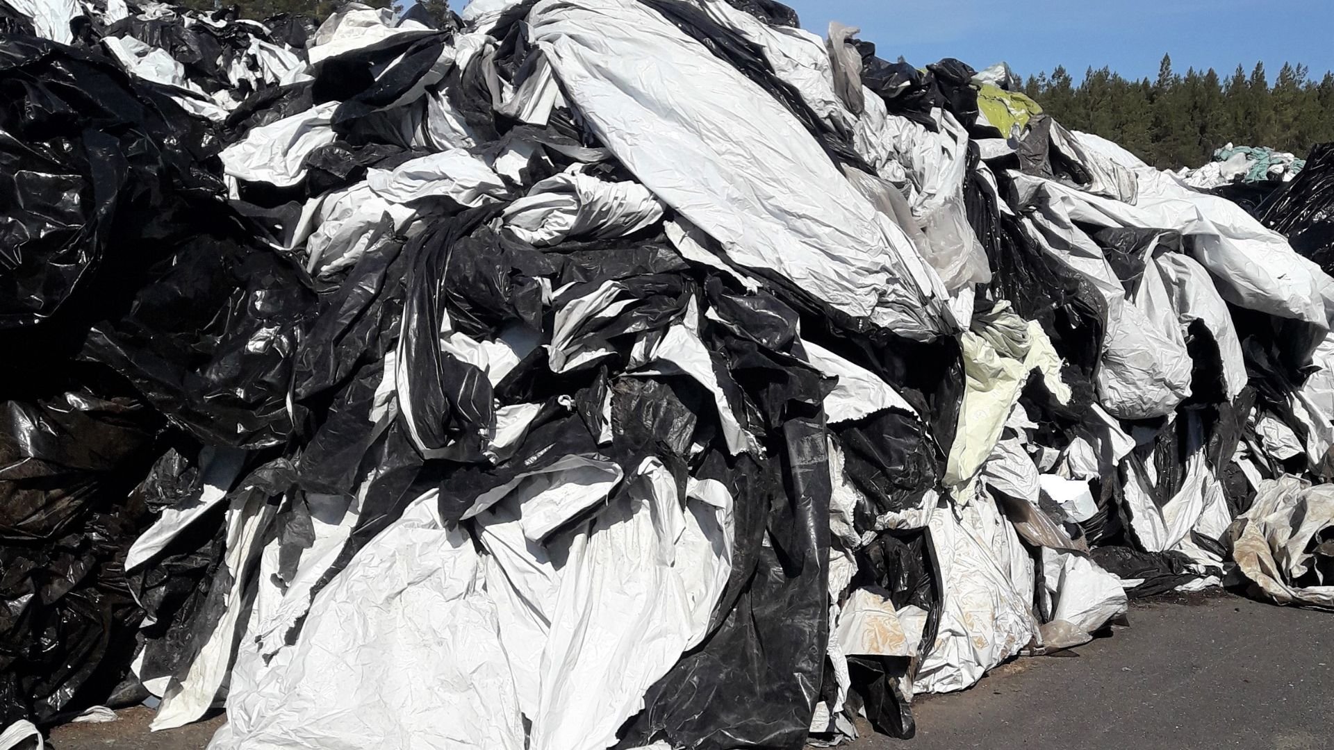 bale wraps waiting for collection